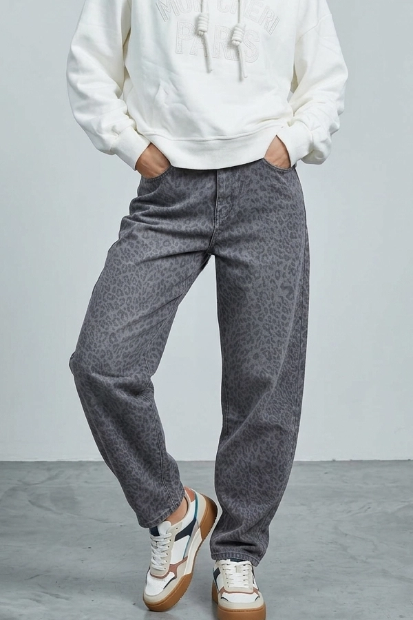 Women's grey leopard barrel jeans styled with white hoodie and sneakers